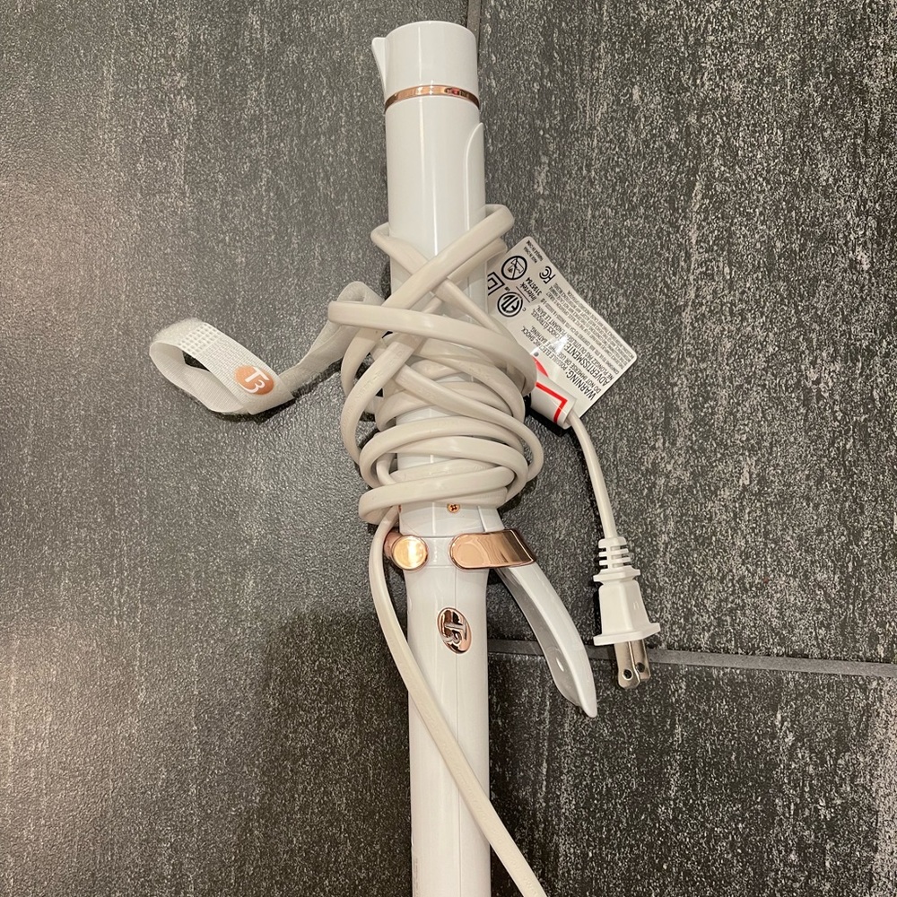 T3 curling iron. Used once.